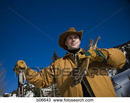 Man with cross country skis View Large Photo Image Stock Image - Man with cross country skis. Fotosearch