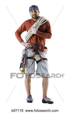 Man with rope and rock climbing belt View Large Photo Image Stock Photograph - Man with rope and rock climbing belt. Fotosearch