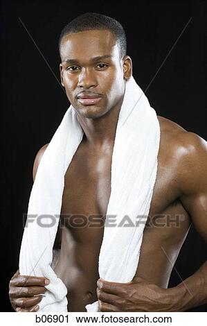 Man with towel View Large Photo Image Stock Image - Man with towel. Fotosearch