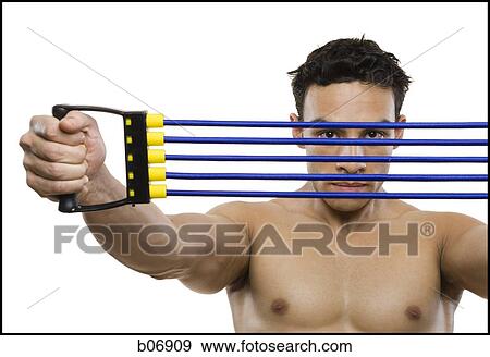 Man working out View Large Photo Image Stock Photo - Man working out. Fotosearch