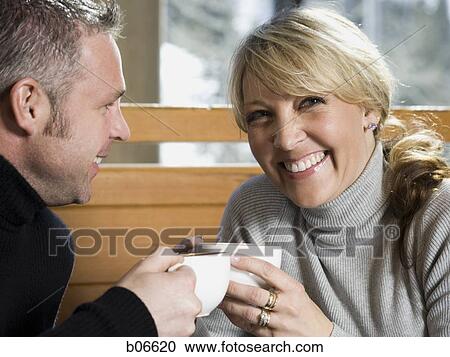 Married couple enjoying quiet moment View Large Photo Image Stock Image - Married couple enjoying quiet moment. Fotosearch