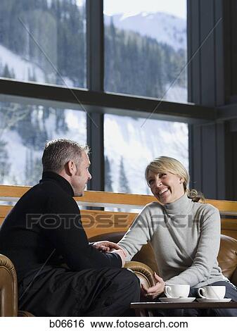 Married couple enjoying quiet moment View Large Photo Image Stock Photograph - Married couple enjoying quiet moment. Fotosearch