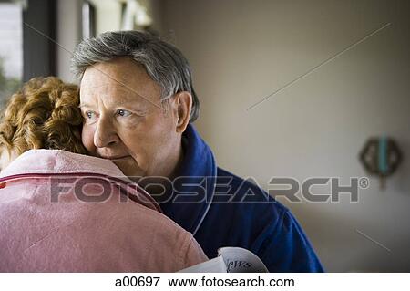 Mature couple embracing View Large Photo Image Stock Photo - Mature couple embracing. Fotosearch