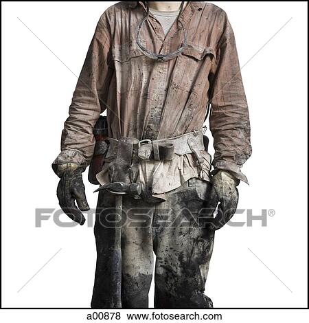 Mine worker in overalls from the neck down View Large Photo Image Stock Photo - Mine worker in overalls from the neck down. Fotosearch