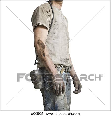 Stock Photography - Mine worker in overalls from the neck down. Fotosearch