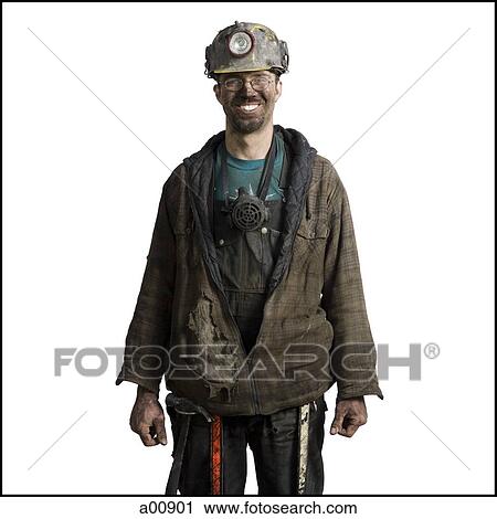 Stock Image - Mine worker with flashlight helmet. Fotosearch