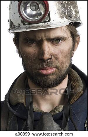 Mine worker with flashlight helmet View Large Photo Image Stock Photo - Mine worker with flashlight helmet. Fotosearch