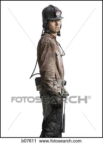 Miner with flashlight helmet View Large Photo Image Stock Image - Miner with flashlight helmet. Fotosearch