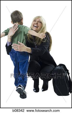 Mother hugging her son View Large Photo Image Stock Image - Mother hugging her son. Fotosearch