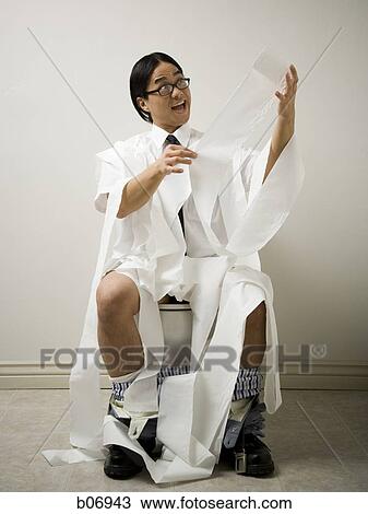 Office worker on toilet with tangled mess of toilet paper View Large Photo Image Stock Image - Office worker on toilet with tangled mess of toilet paper. Fotosearch