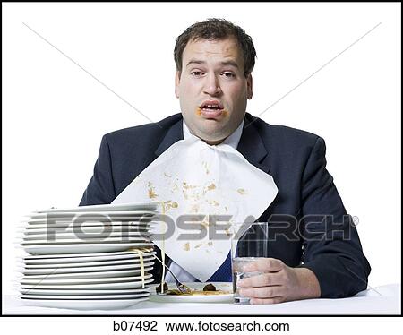 Overweight businessman gorging himself on spaghetti View Large Photo Image Stock Image - Overweight businessman gorging himself on spaghetti. Fotosearch