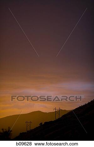 Panoramic view of a landscape at dusk View Large Photo Image Stock Photo - Panoramic view of a landscape at dusk. Fotosearch