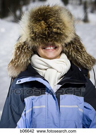 Person with fur hat View Large Photo Image Stock Image - Person with fur hat. Fotosearch