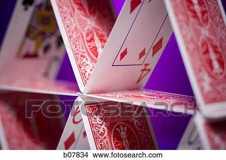 Playing cards stacked in a pyramid shape View Large Photo Image Picture - Playing cards stacked in a pyramid shape. Fotosearch