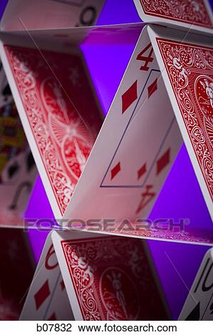 Playing cards stacked in a pyramid shape View Large Photo Image Stock Image - Playing cards stacked in a pyramid shape. Fotosearch