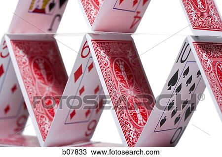 Playing cards stacked in a pyramid shape View Large Photo Image Stock Image - Playing cards stacked in a pyramid shape. Fotosearch