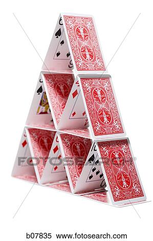 Playing cards stacked in a pyramid shape View Large Photo Image Stock Photography - Playing cards stacked in a pyramid shape. Fotosearch