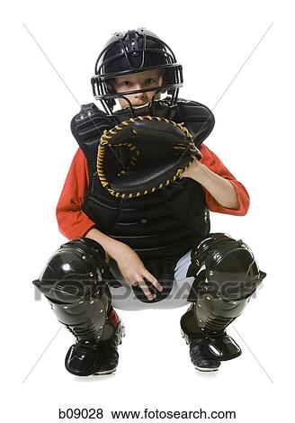 Portrait of a baseball catcher crouching View Large Photo Image Stock Photo - Portrait of a baseball catcher crouching. Fotosearch
