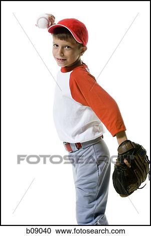 Portrait of a baseball player throwing a baseball View Large Photo Image Stock Image - Portrait of a baseball player throwing a baseball. Fotosearch