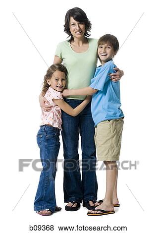 Portrait of a boy and a girl hugging their mother View Large Photo Image Stock Photo - Portrait of a boy and a girl hugging their mother. Fotosearch