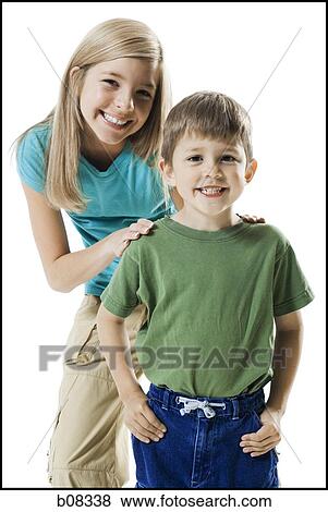 Stock Photo - Portrait of a boy and his sister smiling. Fotosearch