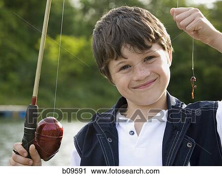 Portrait of a boy fishing View Large Photo Image Stock Image - Portrait of a boy fishing. Fotosearch
