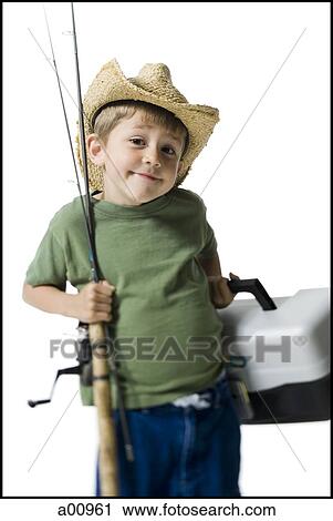 Portrait of a boy holding a fishing rod View Large Photo Image Stock Image - Portrait of a boy holding a fishing rod. Fotosearch