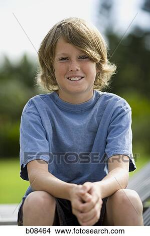 Portrait of a boy smiling View Large Photo Image Picture - Portrait of a boy smiling. Fotosearch