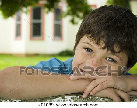 Portrait of a boy smiling View Large Photo Image Stock Photo - Portrait of a boy smiling. Fotosearch
