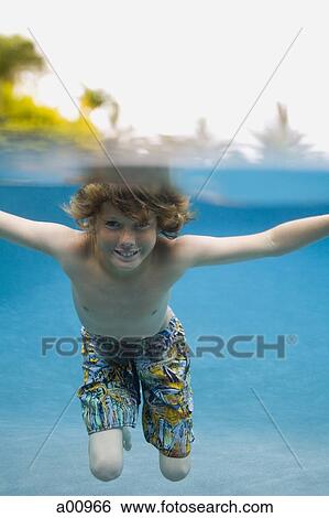 Portrait of a boy swimming View Large Photo Image Stock Photograph - Portrait of a boy swimming. Fotosearch
