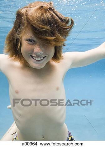 Portrait of a boy underwater View Large Photo Image Picture - Portrait of a boy underwater. Fotosearch