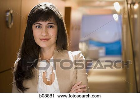 Portrait of a businesswoman smiling View Large Photo Image Stock Image - Portrait of a businesswoman smiling. Fotosearch