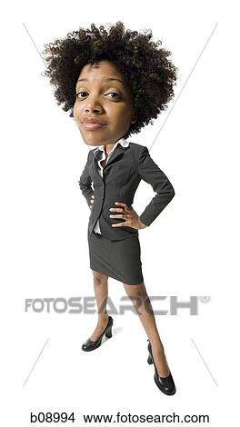 Portrait of a businesswoman standing with hands on hips View Large Photo Image Picture - Portrait of a businesswoman standing with hands on hips. Fotosearch