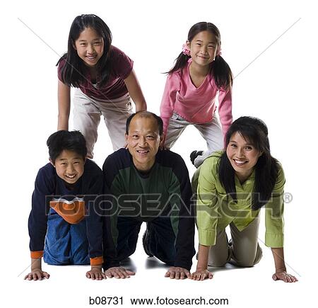 Portrait of a family smiling View Large Photo Image Stock Image - Portrait of a family smiling. Fotosearch