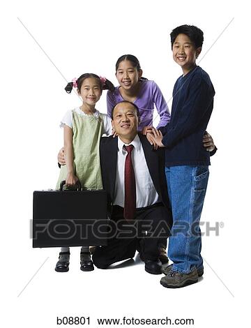 Portrait of a father smiling with his two daughters and son View Large Photo Image Stock Image - Portrait of a father smiling with his two daughters and son. Fotosearch