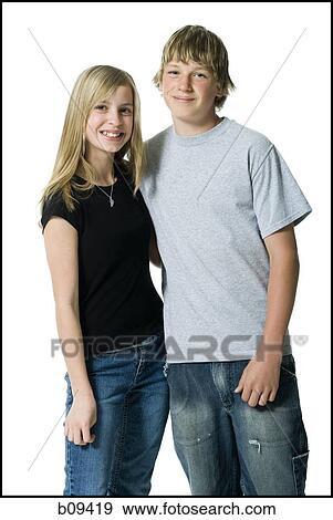 Portrait of a girl and a teenage boy standing together View Large Photo Image Stock Photo - Portrait of a girl and a teenage boy standing together. Fotosearch