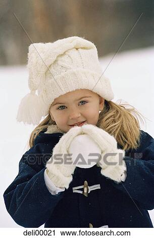 Portrait of a girl holding a ball View Large Photo Image Stock Image - Portrait of a girl holding a ball. Fotosearch
