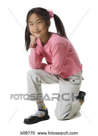 Stock Image - Portrait of a girl smiling. Fotosearch
