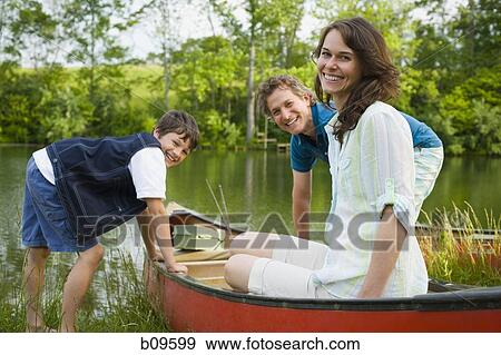 Portrait of a man and a woman with their son View Large Photo Image Stock Photo - Portrait of a man and a woman with their son. Fotosearch