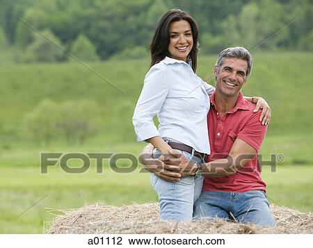 Portrait of a man embracing a woman View Large Photo Image Stock Image - Portrait of a man embracing a woman. Fotosearch