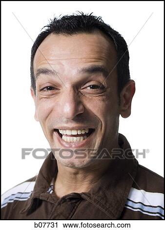 Stock Image - Portrait of a man grinning. Fotosearch
