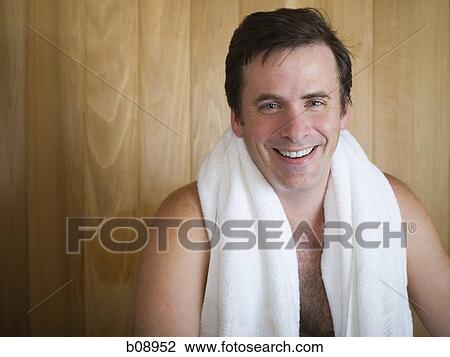 Portrait of a mid adult man sitting in a sauna View Large Photo Image Stock Image - Portrait of a mid adult man sitting in a sauna. Fotosearch