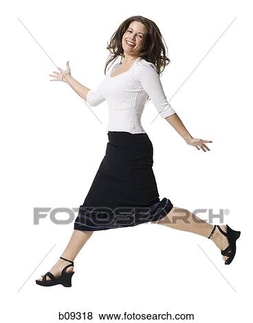 Portrait of a mid adult woman walking View Large Photo Image Stock Photo - Portrait of a mid adult woman walking. Fotosearch
