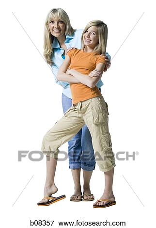 Portrait of a mother and her daughter posing View Large Photo Image Stock Photo - Portrait of a mother and her daughter posing. Fotosearch