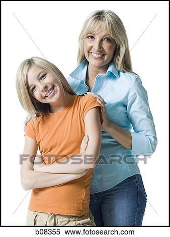 Portrait of a mother and her daughter smiling View Large Photo Image Stock Photography - Portrait of a mother and her daughter smiling. Fotosearch