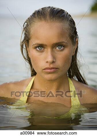 Portrait of a teenage girl in water View Large Photo Image Picture - Portrait of a teenage girl in water. Fotosearch