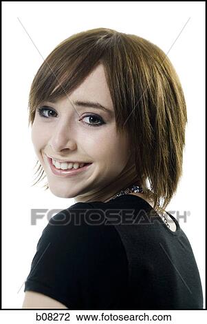 Portrait of a teenage girl smiling View Large Photo Image Stock Image - Portrait of a teenage girl smiling. Fotosearch