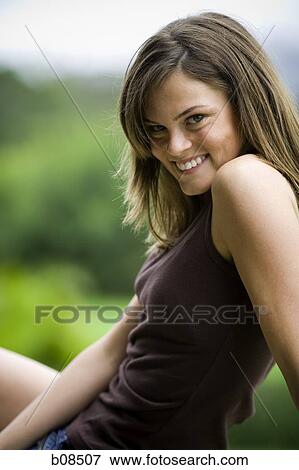 Portrait of a teenage girl smiling View Large Photo Image Stock Photo - Portrait of a teenage girl smiling. Fotosearch