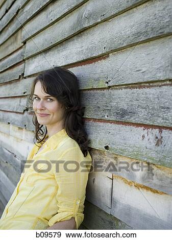 Portrait of a woman smiling View Large Photo Image Stock Photo - Portrait of a woman smiling. Fotosearch