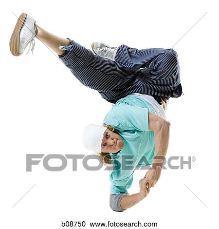 Portrait of a young man break dancing View Large Photo Image Stock Image - Portrait of a young man break dancing. Fotosearch